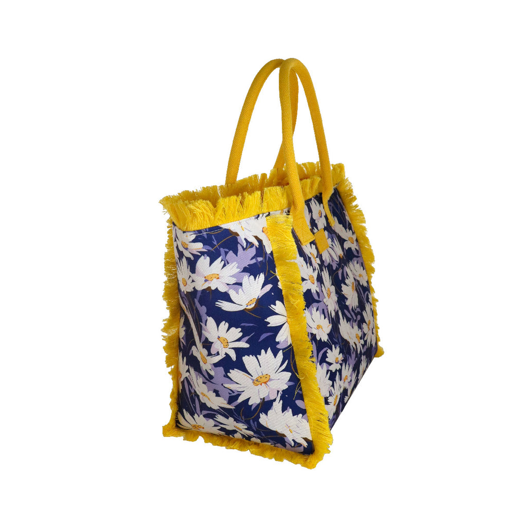 Borsa mare blu con fiori e frange gialle da Donna Camomilla Milano