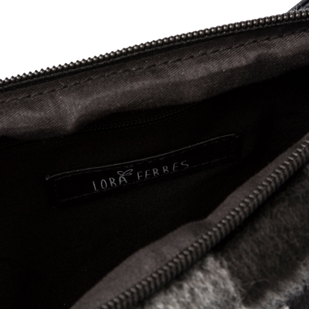 Pochette con pelliccia sintetica nera e bianca da donna Lora Ferres