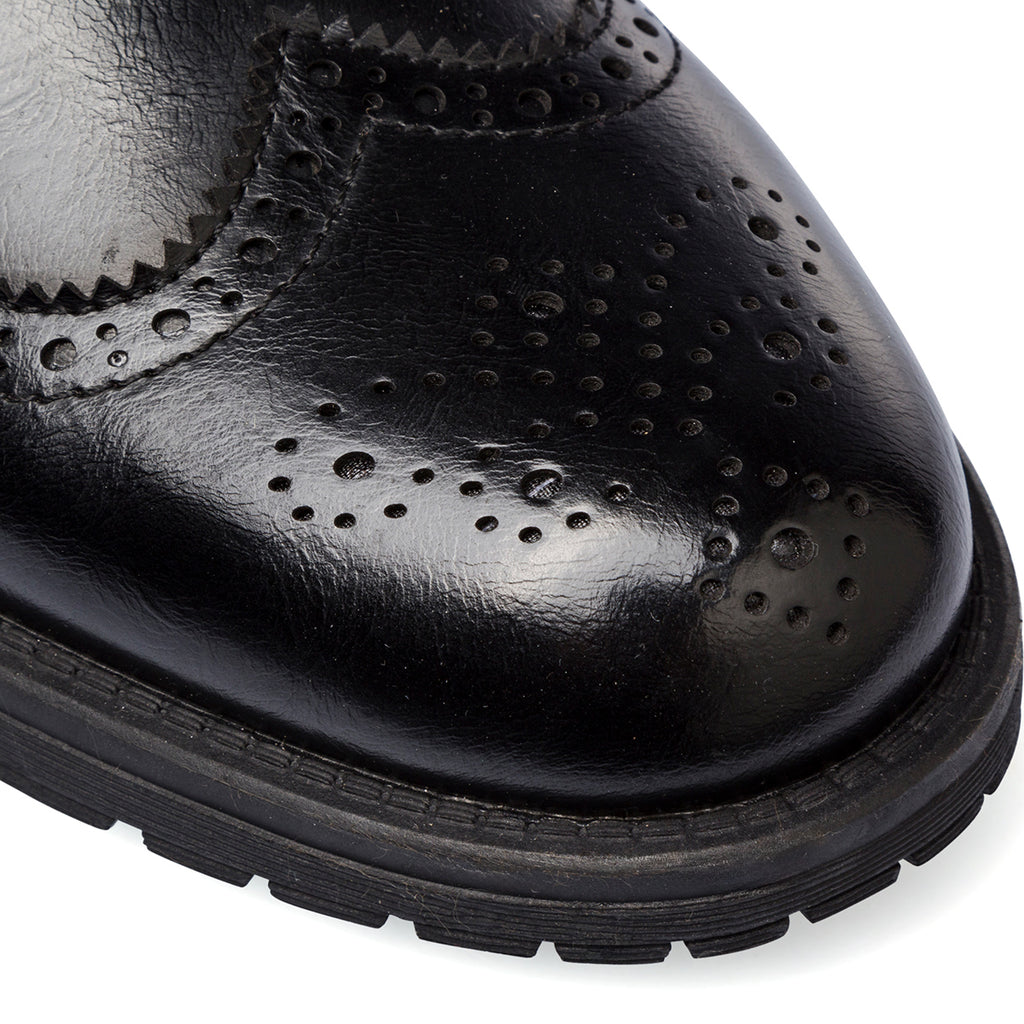 Stivaletti eleganti da uomo neri con dettagli brogue Riflessi Urbani