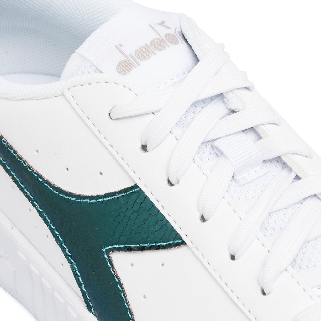 Sneakers da donna bianche con dettaglio verde metallizzato Diadora