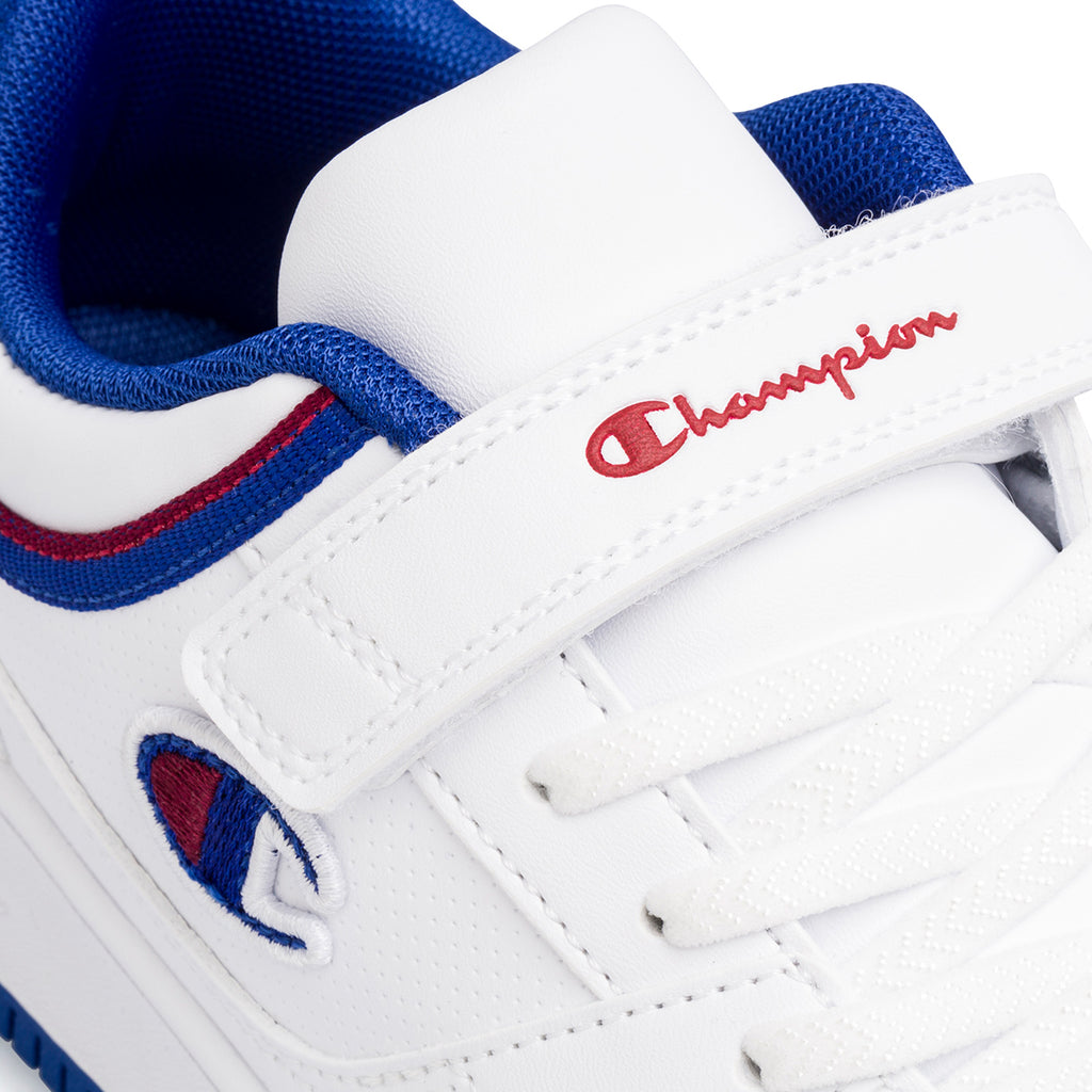 Sneakers da ragazzo bianche cobn dettagli blu e rossi Champion Rebound Low