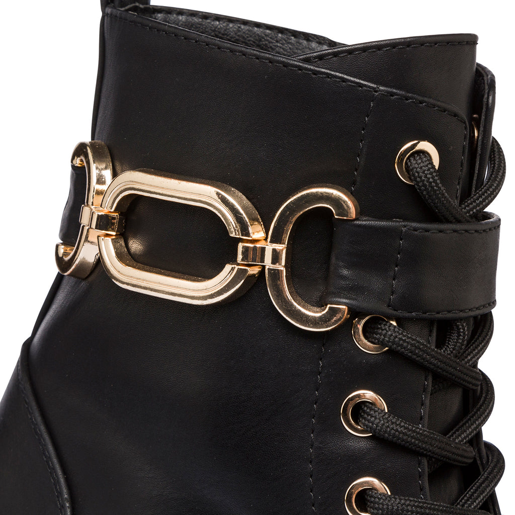 Anfibi da donna neri con cinturino color oro Lora Ferres