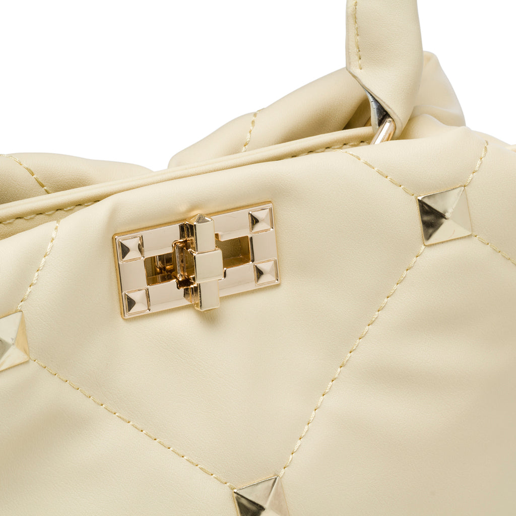 Borsa a mano gialla effetto trapuntato con borchie piramidali Lora Ferres