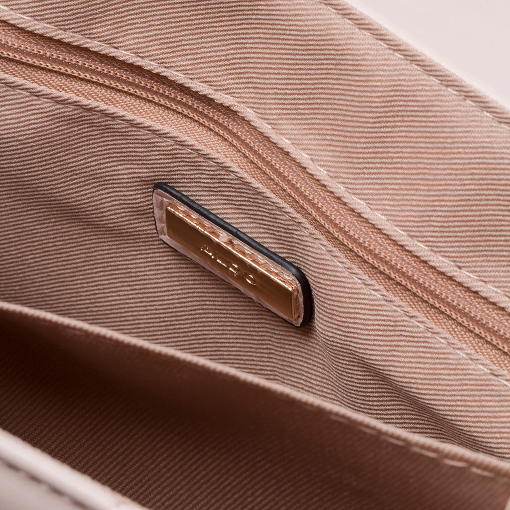 Borsa a tracolla rosa da donna con borchie piramidali ALDO Olelirin