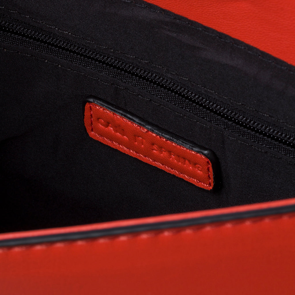 Borsa a tracolla arancione in pelle vegana effetto intrecciato Call It Spring Crisscross