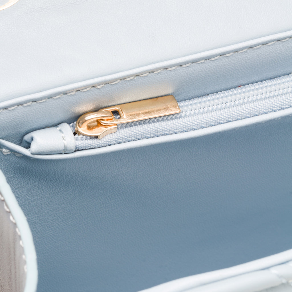 Borsa trapuntata azzurra da donna con tracolla a catena Lora Ferres