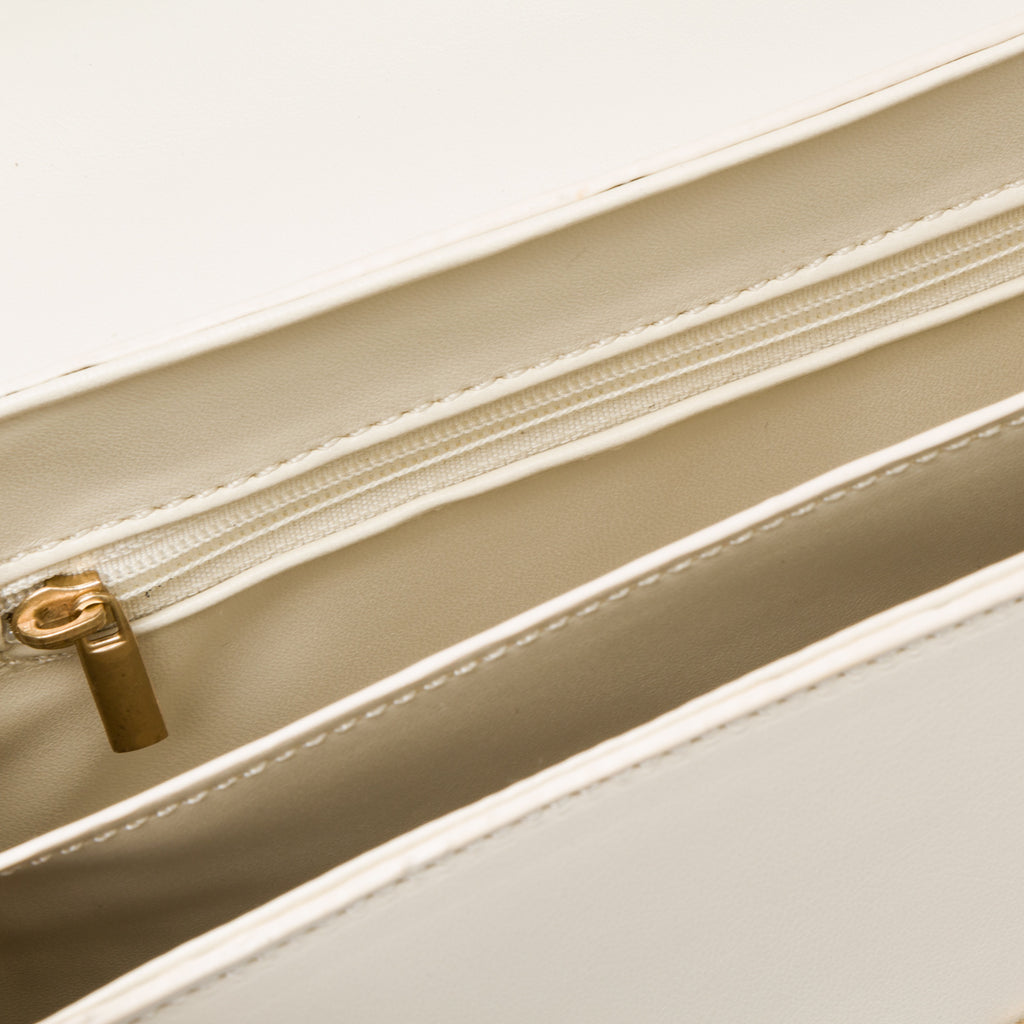 Borsa a tracolla bianca off-white da donna con morsetto Lora Ferres