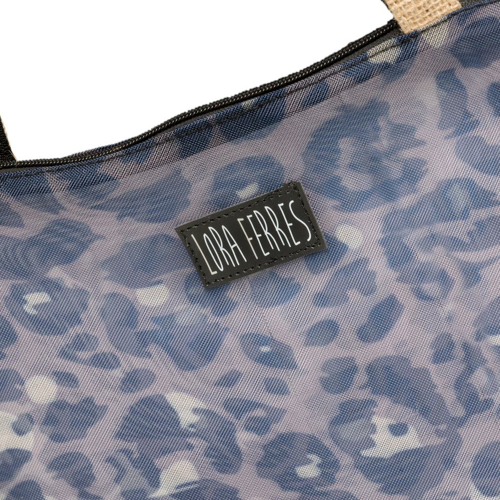 Borsa mare effetto trasparente con fantasia animalier Lora Ferres