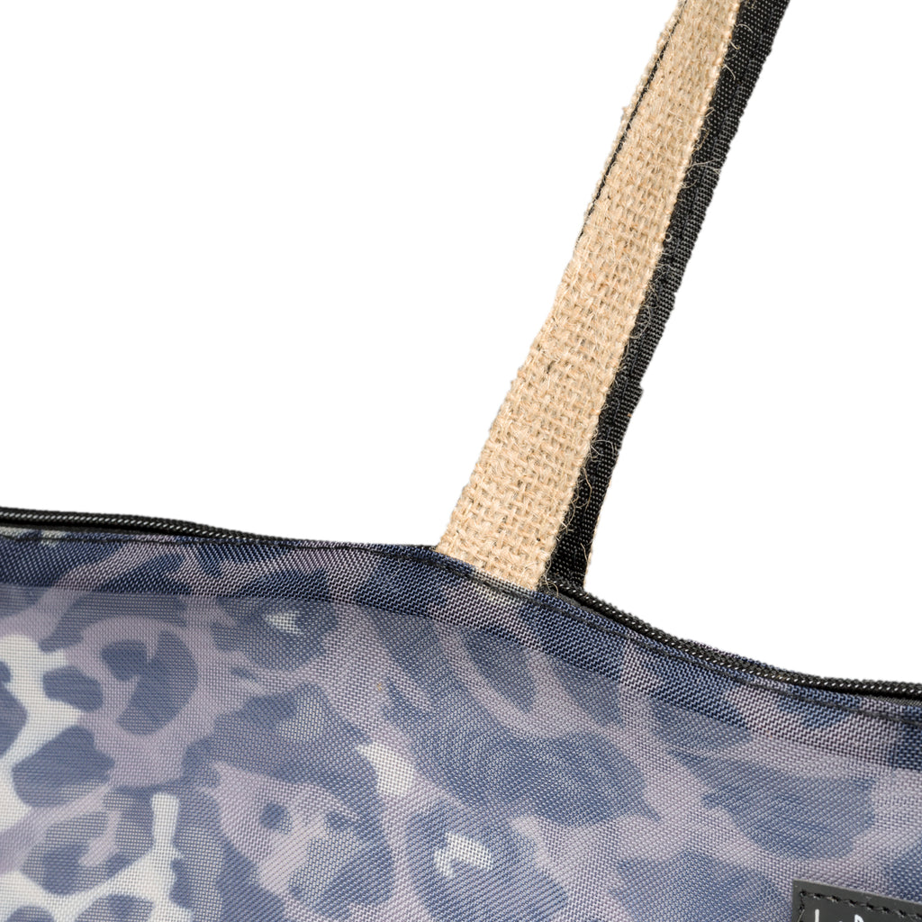 Borsa mare effetto trasparente con fantasia animalier Lora Ferres