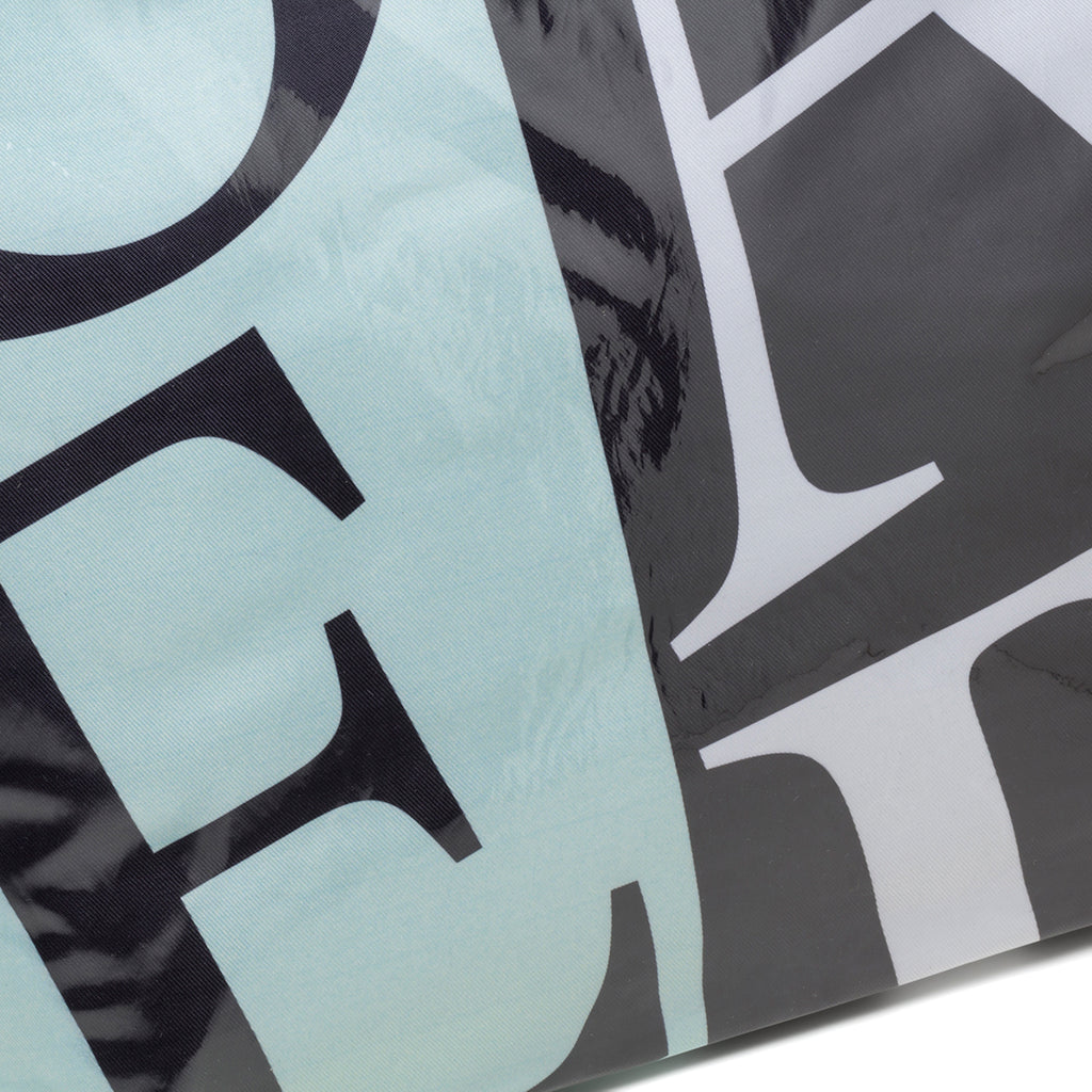 Borsa da mare acquamarina e nera Lora Ferres