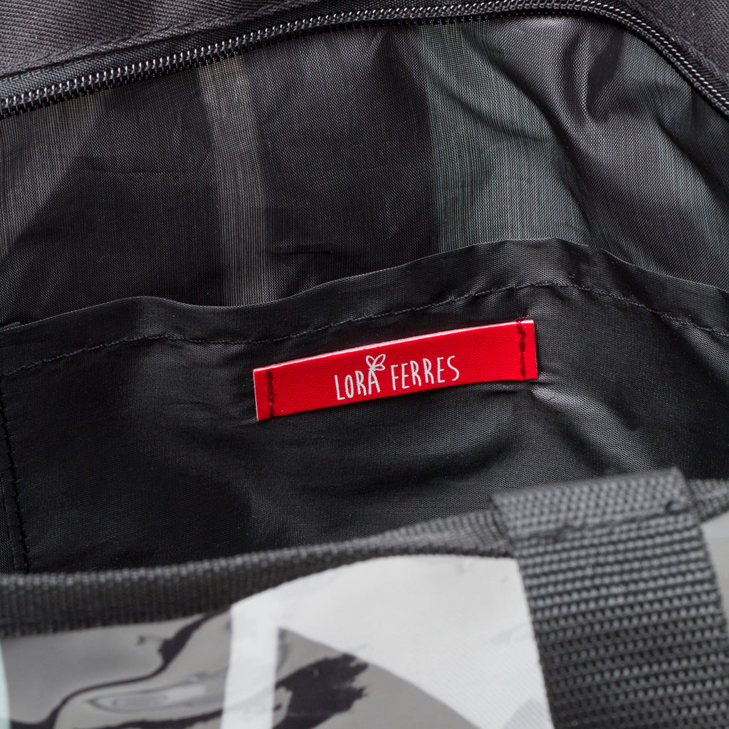 Borsa da mare acquamarina e nera Lora Ferres