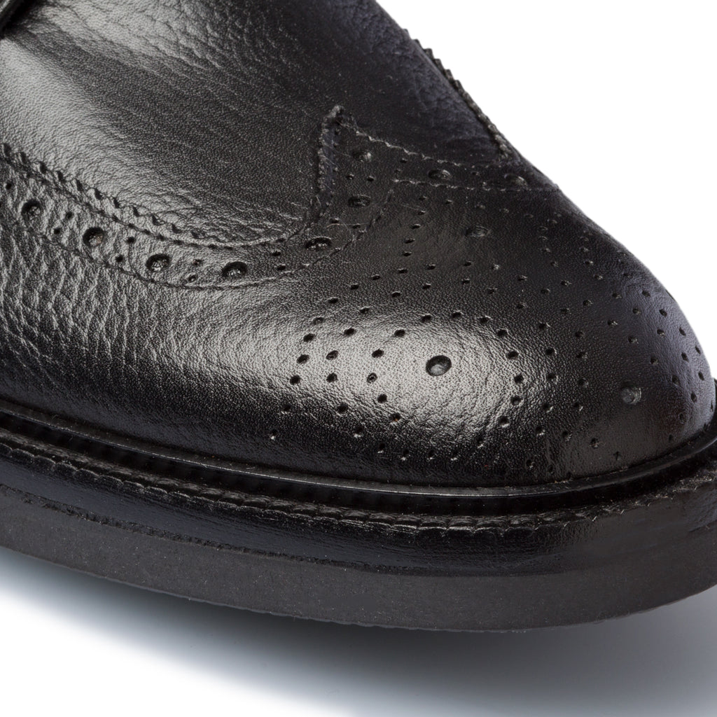 Stivaletti neri in pelle con dettagli brogue Primopiano