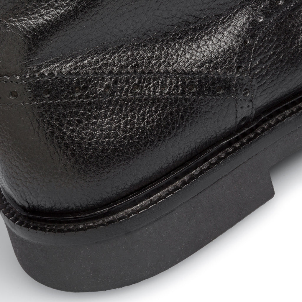 Stivaletti neri in pelle con dettagli brogue Primopiano