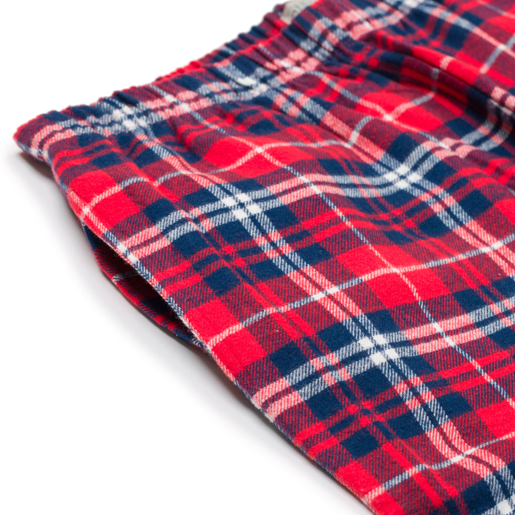 Pigiama natalizio bianco e blu da donna con cuore e pantaloni in stile tartan