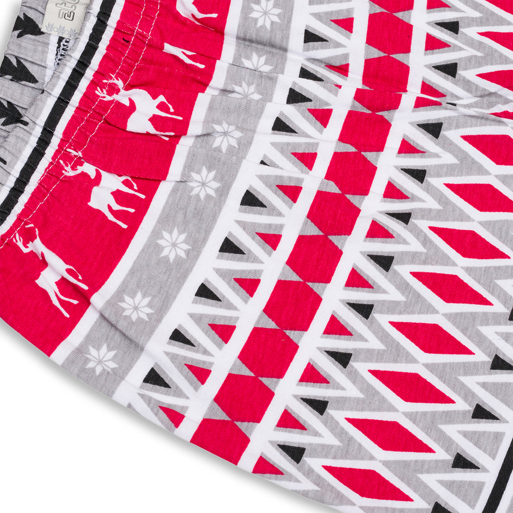 Pigiama natalizio da bambini bianco e grigio con renna ricamata