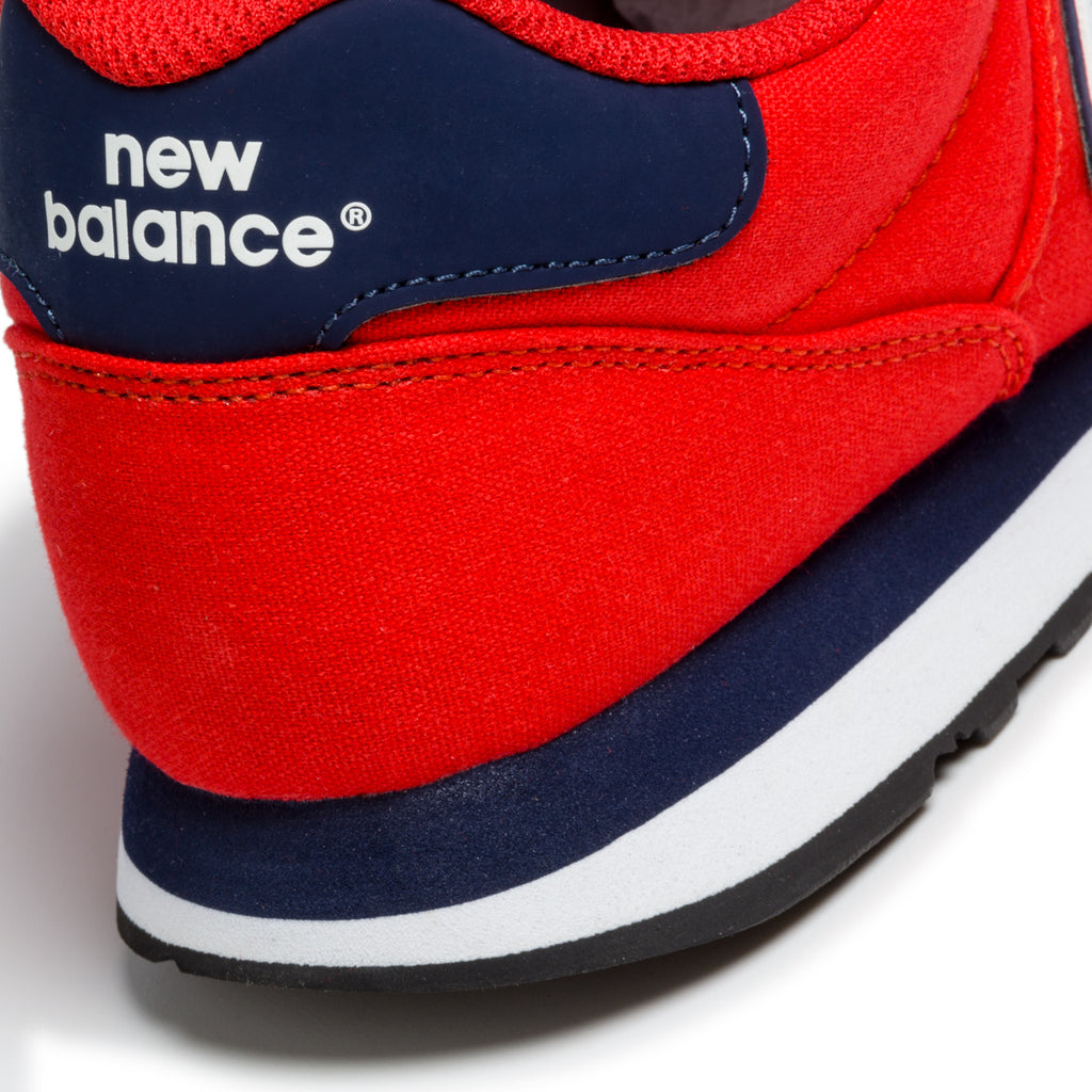 Sneakers rosse in tessuto mesh con logo a contrasto New Balance 500