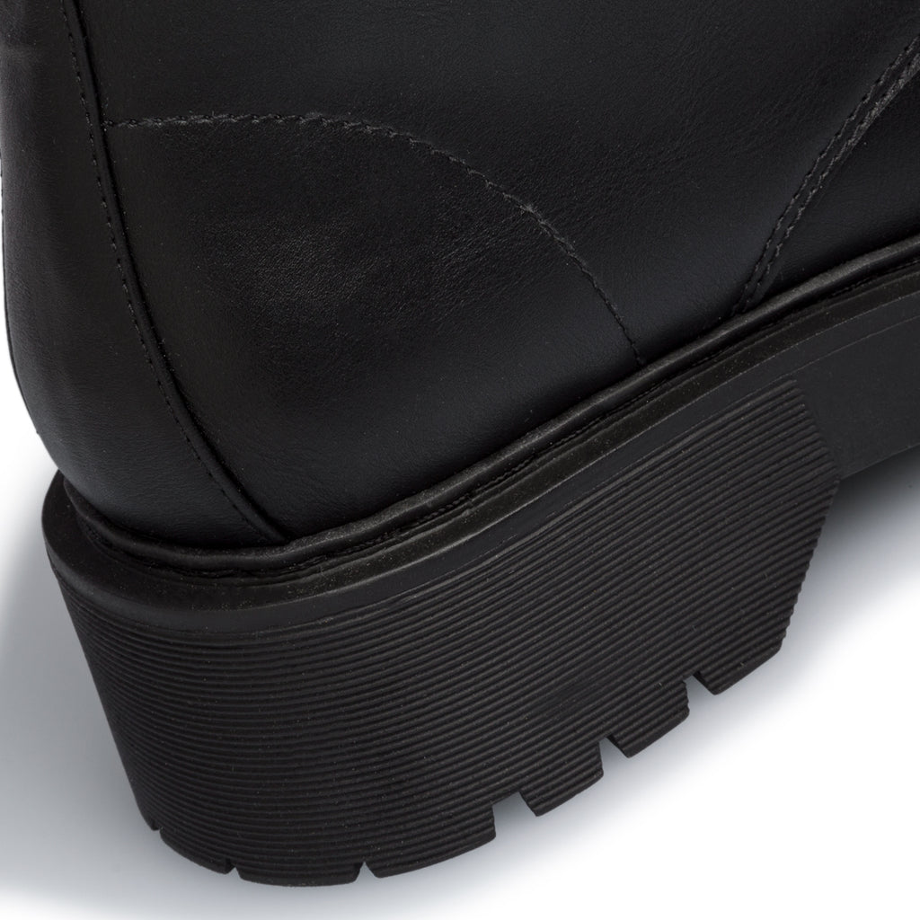 Anfibi neri con suola platform Lora Ferres